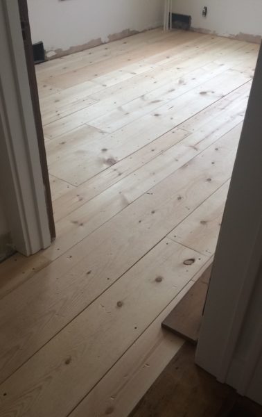 Inexpensive pine board flooring/office 