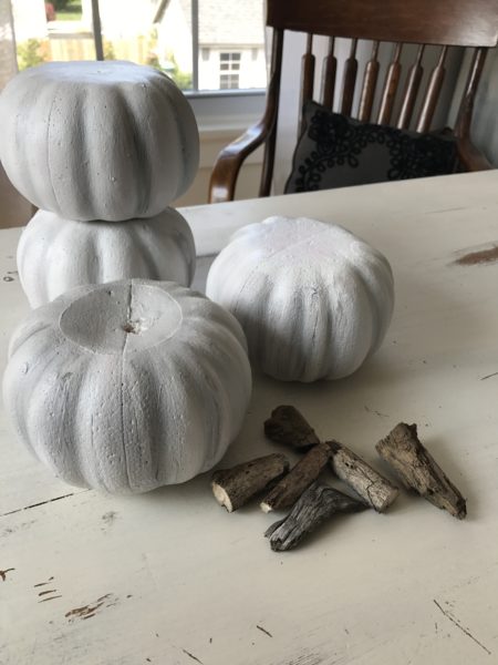 Add cute wooden tree branch stems to give a realistic look to Dollar Tree pumpkins - House on Winchester