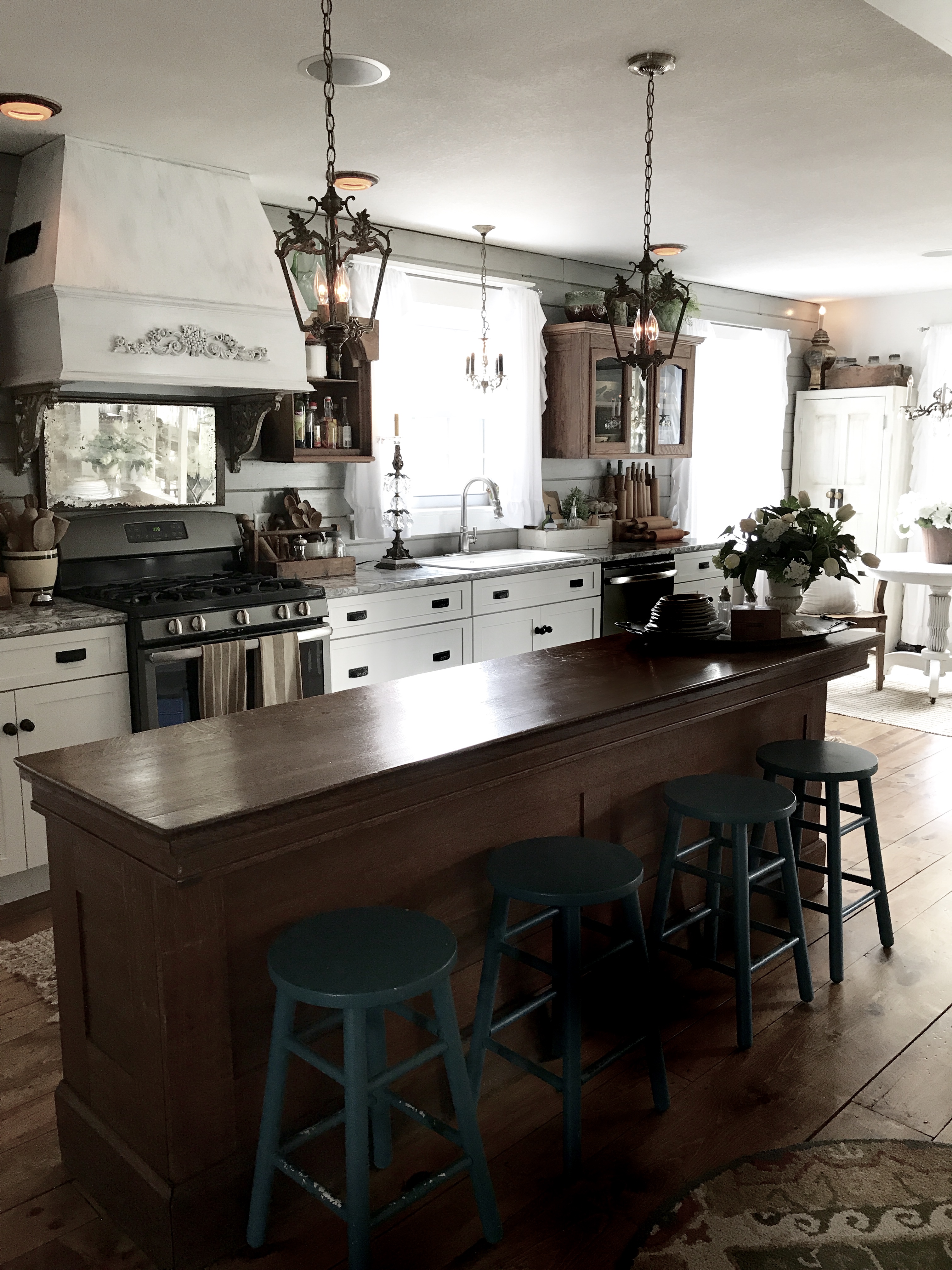 Antique store counter as kitchen island - House on Winchester