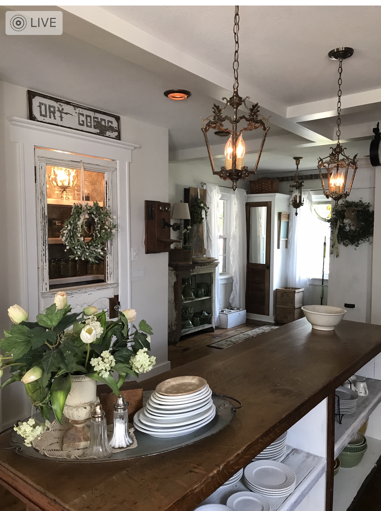 White chippy pantry door with antique store counter as an island - House on Winchester