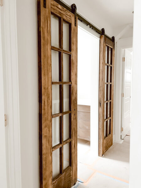 Antique Doors for the Guest Bathroom are Hung - Deb and Danelle