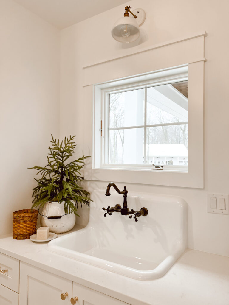 Vintage Looking Laundry Room Sink and Faucet Deb and Danelle