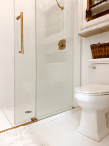 Shower Door with Gold Hardware - Deb and Danelle