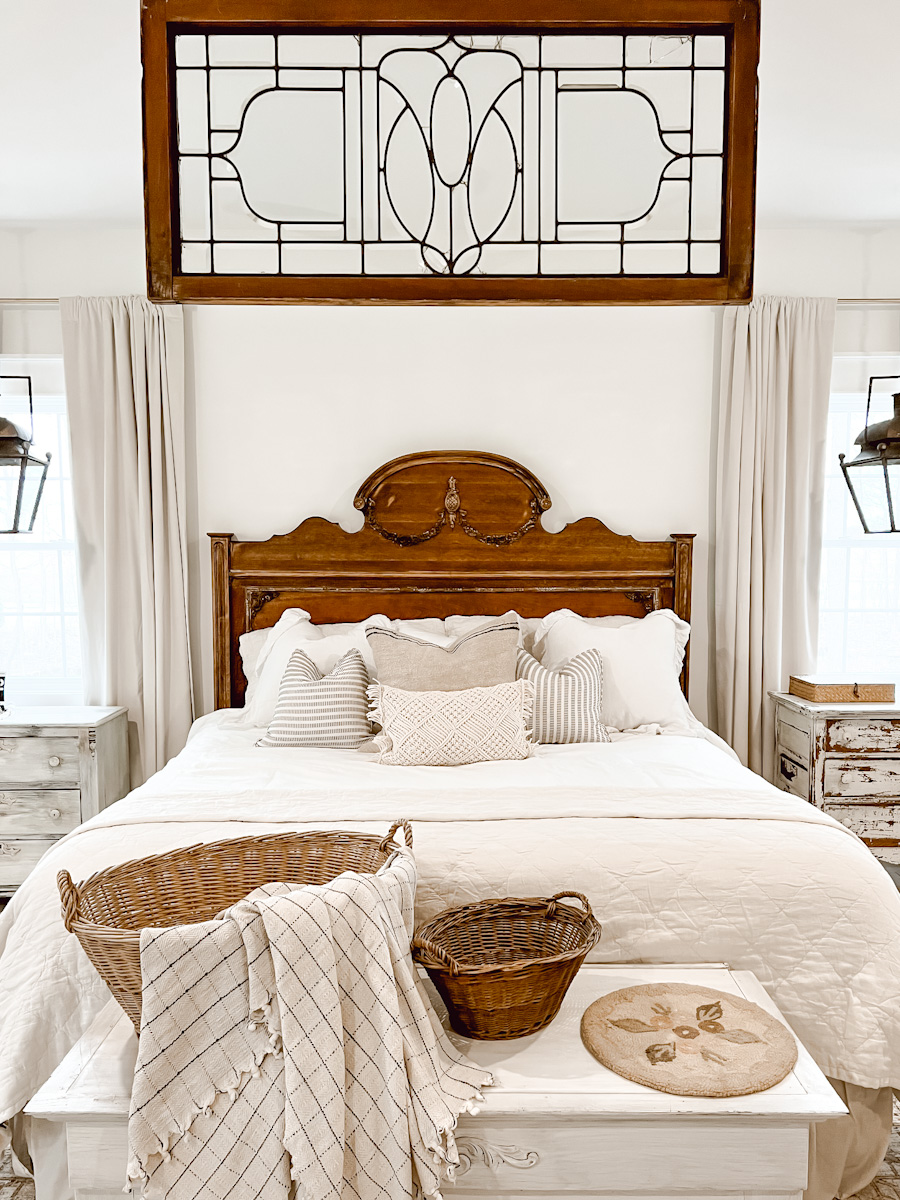 Leaded glass window above bed