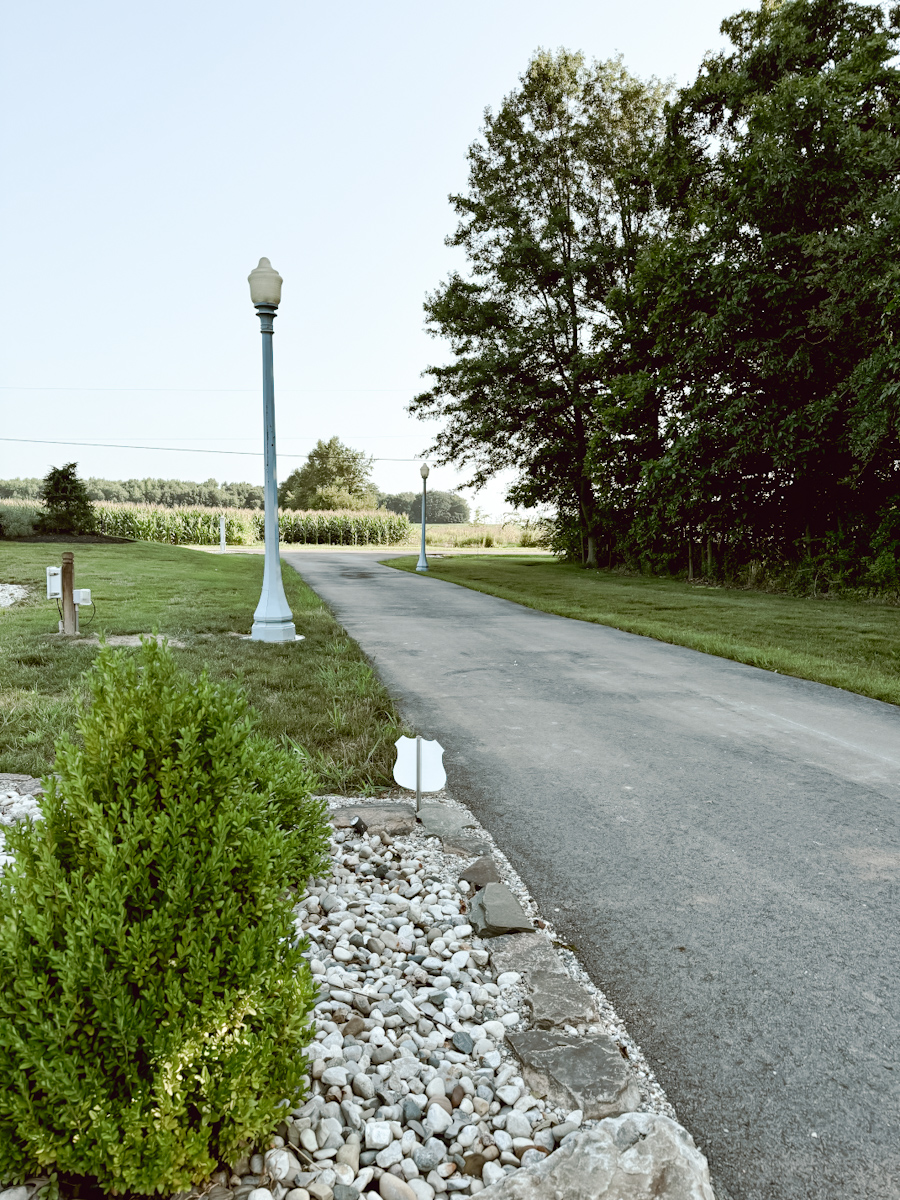 Antique Lamp Posts Lining the Driveway